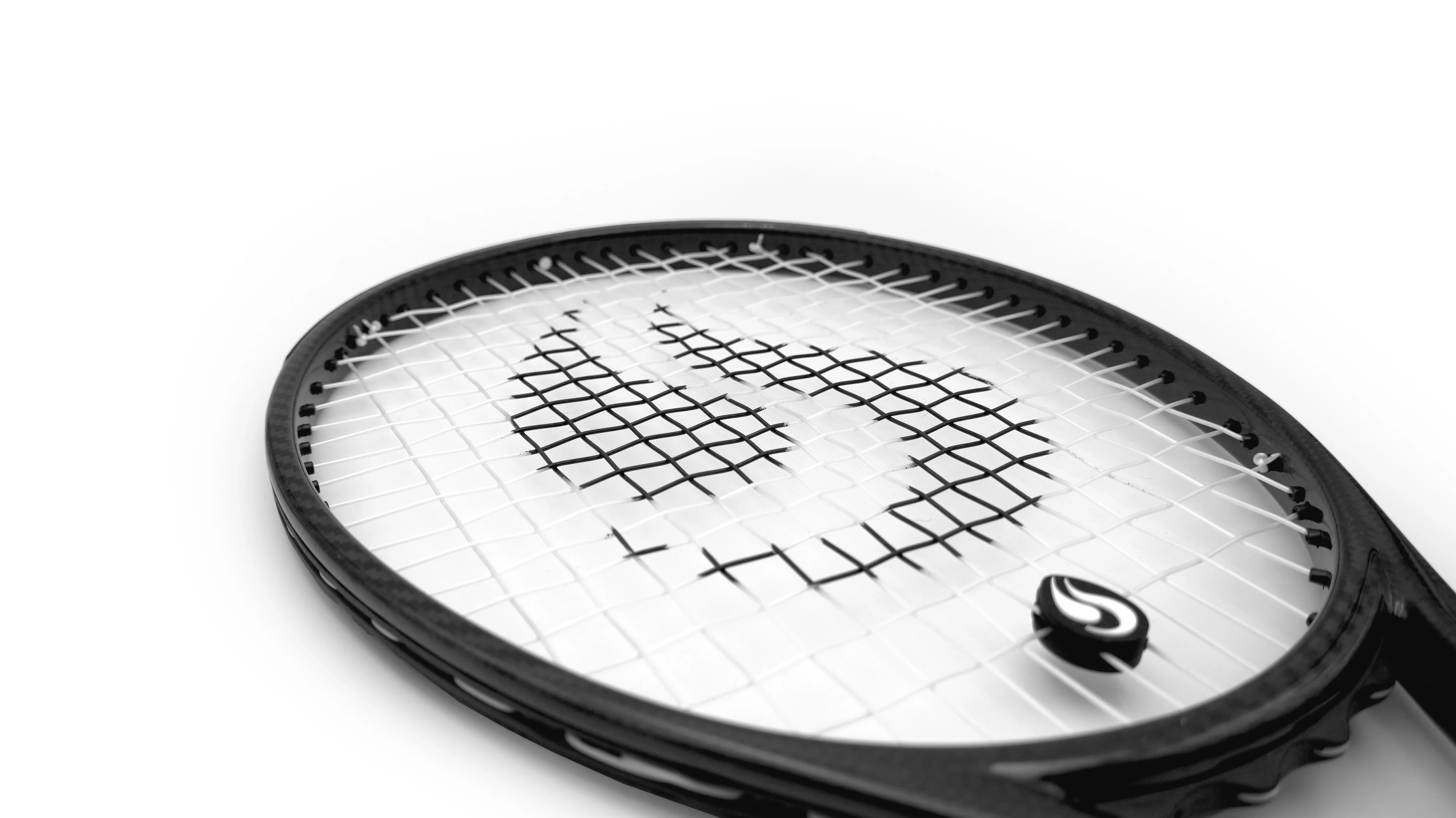 Detail of String Project Armour Soft tennis strings strung on a racket