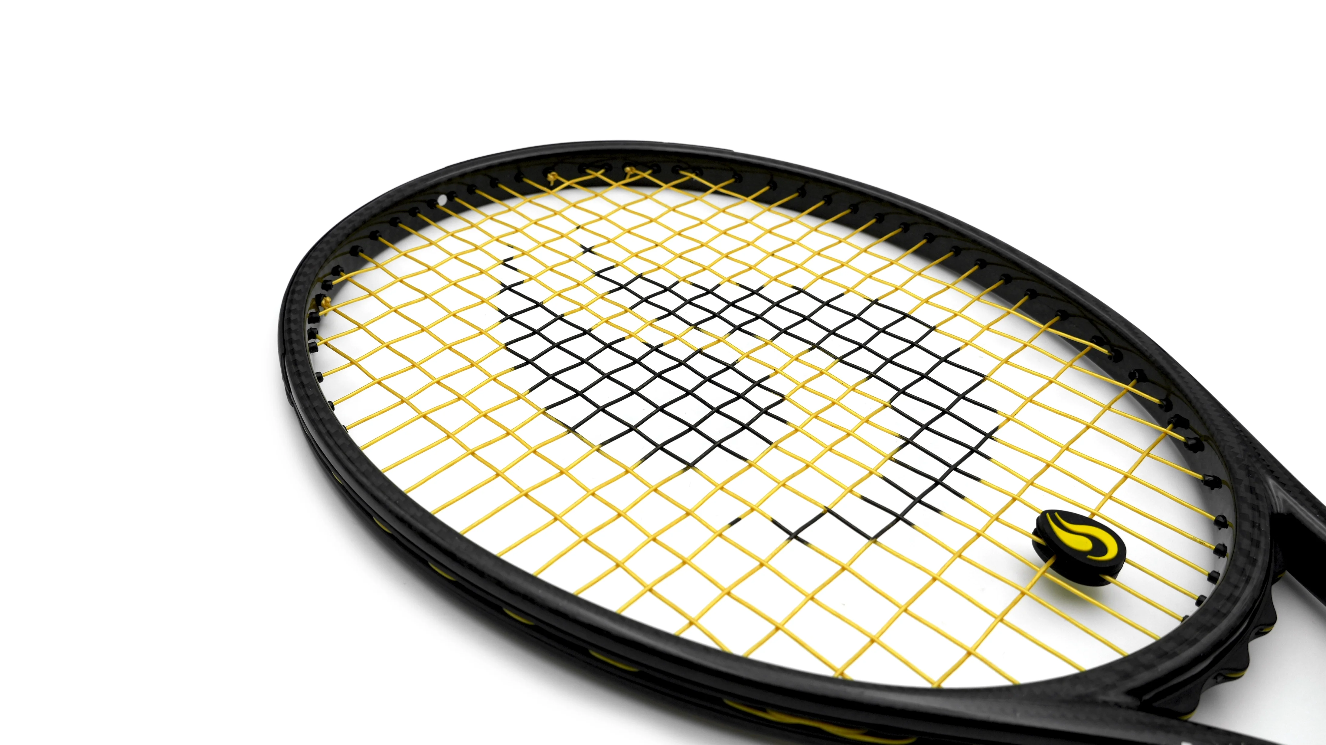 Detail of String Project Gold tennis strings strung on a racket